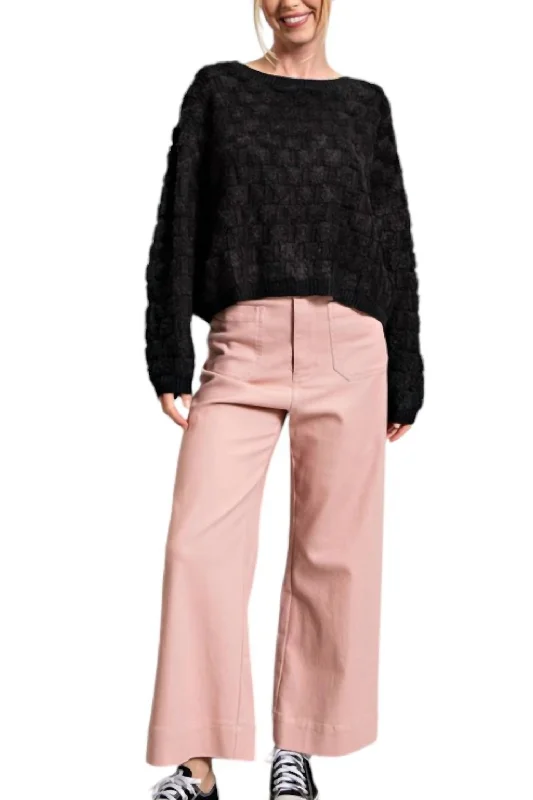 Refresh your wardrobe with trendy women’s apparel   Tania Texture Knit Top In Black